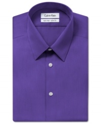 Saturated color and a slim fit take this no-iron Calvin Klein dress shirt from basic to modern in an instant.