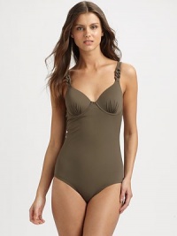 A swim style with bra sizing and comfy shapewear capabilities. It flattens the tummy, slims hips and flatters the rear. The adjustable, chain-link-detail straps and underwire cups offer additional support.Adjustable strapsBust-flattering, gathered details on underwire cupsFully lined72% nylon/28% spandexHand washImported