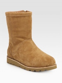 Buttery suede forms this go-to boot lined in shearling for superior comfort. Shaft, 8½Leg circumference, 14Suede upperSide zipShearling liningRubber trek solePadded insoleImported