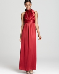 Amsale's flowing satin dress lends a feminine look with a bow-detailed neckline.