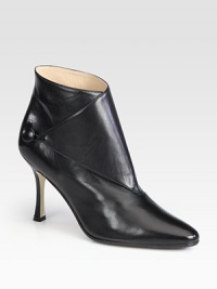 A cross-over panel secured by a chic button adds fashionable style to this slick leather design. Self-covered heel, 3½ (90mm)Leather upperButton closureLeather lining and solePadded insoleMade in ItalyOUR FIT MODEL RECOMMENDS ordering true size. 