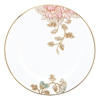 Painted Camellia brings vintage florals to life with just the right amount of color to make the dinner table unique. Draped against a gold-rimmed white canvas, delicate painted florals create a beautiful melodic feel. The salad plate, defined by a rich black background, is artfully juxtaposed to its white-bodied counterpart for a dramatic contrast.