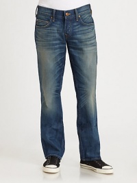 A not-so-basic pair of faded, whiskered denim in a straight-leg style with traditional touches.Five-pocket styleZip flyStitched back pocketsInseam, about 32CottonMachine washMade in USA