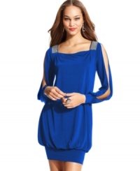 Bombshell dress alert! This sultry number from Baby Phat will get the party started with its plunging V-neck at the back and flirty split sleeves.