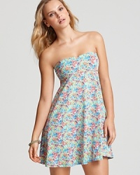 Echo's floral-print cover up makes a demure addition to your poolside look. Slip this strapless dress over a favorite suit and add wedges for a sun soaked party.