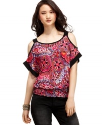 Brighten up your day ensemble with this cutout top from BCX featured in a brilliant, printed fabric!