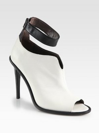 An ankle strap puts a modern spin on this sculpted two-tone leather design, with a sexy open toe and towering heel. Stacked heel, 4¾ (120mm)Leather upperOpen toeBack zipLeather lining and solePadded insoleMade in Italy