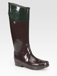 Two-tone, waterproof essential updated by goldtone hardware, intricate stitching and a classic H emblem for an equestrian-inspired look. Shaft, 15½ Leg circumference, 16 Rubber upper Rubber sole Padded insole Imported