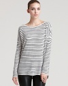 A Vince cashmere sweater is complete with a shirttail hem and stripes--for a casual look that inspires style confidence.