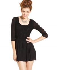 With its lacy bodice and sweet, babydoll design, this minidress from American Rag highlights your girlish style.