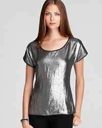 Go for the silver in this simply-structured top that adds party-perfect pizzazz to basic black or denim.