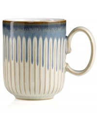 A rustic glaze, textured feel and rounded base make Denby's fluted mug a stylish go-to for cocoa, coffee and soup. Ultra-sturdy stoneware heats and reheats easily for everyday, anytime use.