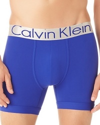 A steel-hued logo waistband adds edge to this bold-colored boxer brief from Calvin Klein.