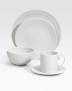 An elegantly detailed cereal bowl is made entirely by hand in fine Limoges porcelain with a raised pearl border. From the Perlee White Collection Porcelain 3H X 5½ diam. Dishwasher safe Imported 