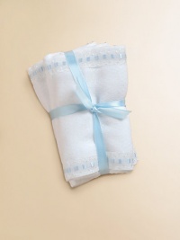 Soft cotton burp pads, decorated with cute blue dot trim.Includes two padsMachine washCottonImported