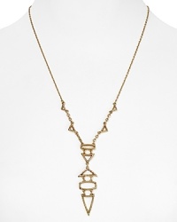 You don't have to be good at math to work fresh angles with House of Harlow 1960's geometric drop necklace. Gold and gleaming, it aces style tests with a sleek LBD.