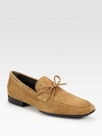 Step ahead in style in this classic loafer design, handcrafted in Italy in soft, suede topped off with a bow detail.Suede upperLeather liningRubber soleMade in Italy