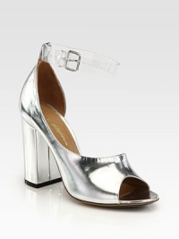 Mirrored metallic leather in a feminine d'Orsay silhouette, topped with an interchangeable, clear ankle strap and chunky block heel. Self-covered heel, 4 (100mm)Metallic leather upperLeather lining and solePadded insoleImportedPlease note: Silver and clear ankle straps are included. 