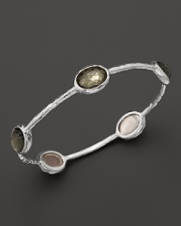 Faceted pyrite doublets dot a sterling silver bangle from Ippolita.