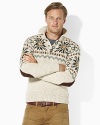 A timeless Fair Isle pattern and suede accents impart heritage character and refined style to a warm wool-blend pullover.