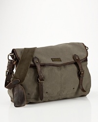 Authentic leather accents make this versatile canvas messenger bag a suitable carryall for work or weekend.