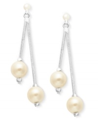 Two lovely acrylic pearls (7mm) are suspended from linear wires on these darling earrings from Charter Club. Crafted in silver tone mixed metal. Approximate drop: 1-3/4 inches.