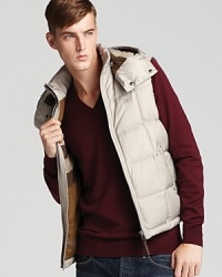 Beat the chill with this sporty puffer vest from Burberry Brit.