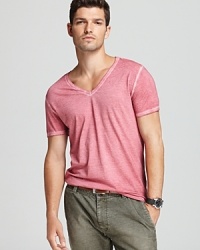 The Toulouse tee's innovative dye technique adds contrast and depth, especially at the V-neckline and short sleeves.