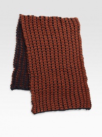 A versatile two-toned scarf is perfectly knitted to keep you warm and cozy all winter long.About 16W x 69LAcrylicDry cleanImported