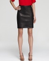 This gorgeous leather Theory skirt arrives right on course for fall in a classic pencil skirt silhouette--heels and a classic cashmere crew carries you seamlessly from day to dark.