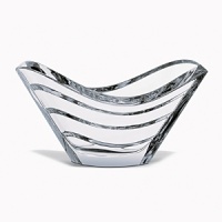 Evoking the magic of the sea, this alluring bowl is meticulously cut so that light magically flows from the base to the top edge.