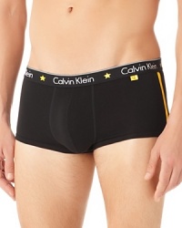 Rendered in soft, breathable cotton and furnished with a low rise, these trunks from Calvin Klein offer everyday comfort and sporty details like the star and logo waistband and side stripes.