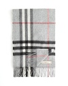 Burberry's oversized check adorns this luxe cashmere scarf.