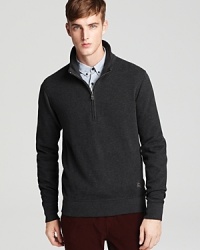 Burberry Brit's sleek half-zip pullover boasts comfort and classic style.