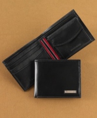 Colorful striping is a preppy touch on the inside of this versatile leather wallet from Tommy Hilfiger.