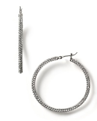 Elegant hoop earrings with pave stone clusters in polished silver plate.