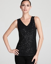 A splash of sequins takes an essential DKNY tank to new levels of luxe. Let the style shine beneath a crisp blazer for 24-7 polish.