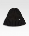 Stay forever warm and toasty in this ribbed knit beanie accented with logo detail.AcrylicSpot cleanImported