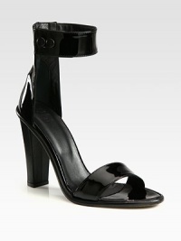 An on-trend ankle strap tops this glossy patent leather silhouette, heightened by a smooth calfskin heel. Leather-covered heel, 4¾ (120mm)Patent leather upperWide ankle strap with double snap closuresLeather lining and solePadded insoleMade in Italy