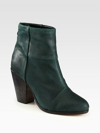 Urban-ready ankle boot in waxy suede with a commanding stacked heel. Stacked heel, 3½ (90mm)Suede upperBack zipLeather lining and solePadded insoleImported