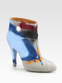 Fine craftsmanship defines this modern ankle boot of cement-covered leather, topped with graffiti in vivid hues. Self-covered heel, 4½ (115mm)Cement-dipped leather upperPull-on styleLeather lining and solePadded insoleMade in Italy