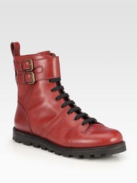 Edgy leather kicks with signature letter stitching and adjustable buckle straps for a casual-cool look. Stacked platform, 1 (25mm)Leather upperAdjustable ankle strapsLeather liningRubber trek solePadded insoleImported