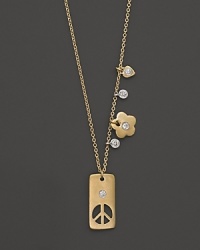 Diamonds, a blossom and a gleaming peace sign in 14K yellow gold. By Meira T.