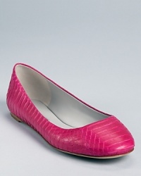 Crafted in genuine snakeskin, these luxe ballet flats from Vera Wang lend a sleek yet playful look.