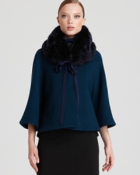 Give your long coat the night off and pair this 1940s-inspired Elie Tahari capelet and faux-fur stole combo over a chic little cocktail dress for a night on the town.