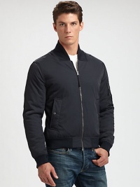 This lightweight bomber makes a smooth transition into those cool, autumn nights to come, effortlessly shaped in a rich cotton blend.Two-way zip frontStand collarSlash waist pocketsZippered pocket at sleeveRibbed knit collar, cuffs and hemAbout 24 from shoulder to hem98% cotton/2% elastaneMachine washMade in USA