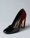 Suede meets polish in these Pour La Victoire heels. They shine with metal details at each heel and high-gloss cap toes.