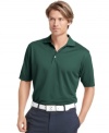 Play your best game with this Izod golf shirt featuring moisture wicking and UV protection.