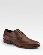 A heritage style for any gentleman of style, crafted in leather with brogue-style perforations. Embossed logo Padded insole Leather/rubber sole Imported 