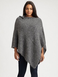 A romantic neckline and relaxed fit ensure this sparkling poncho will be a complementary layer for your favorite wardrobe. Pull-on styleAsymmetrical hemAbout 25 from shoulder to hemMohair/nylon/wool/polyester/acrylic/alpacaDry cleanImported of Italian fabric